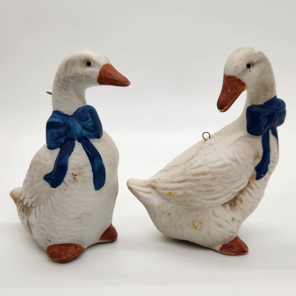 Charming White Goose Figurines with Blue Bows